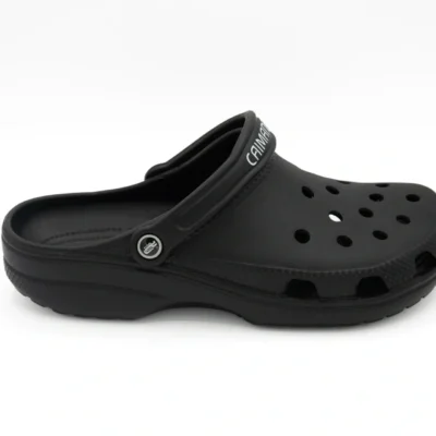 A black crocs shoe is shown here.