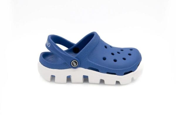 A pair of blue and white crocs with a white sole.